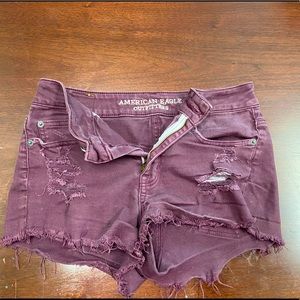 American Eagle distressed burgundy jean shorts